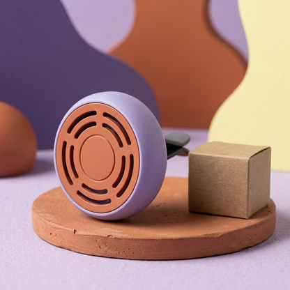 Angled main image of single lavender terracotta holder on terracotta podium